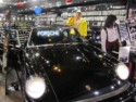 June finds a Porsche inside a store